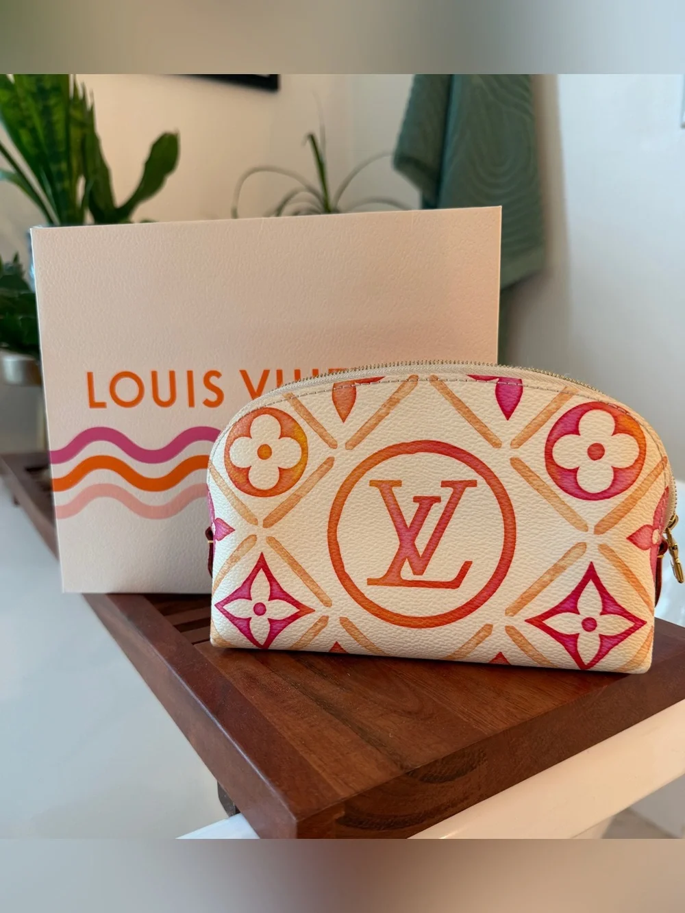 Louis Vuitton Cream Cosmetic Pouch with Pink & Orange Monogram.